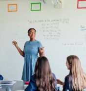 Female teacher discussing STEM: Mathematics during class.